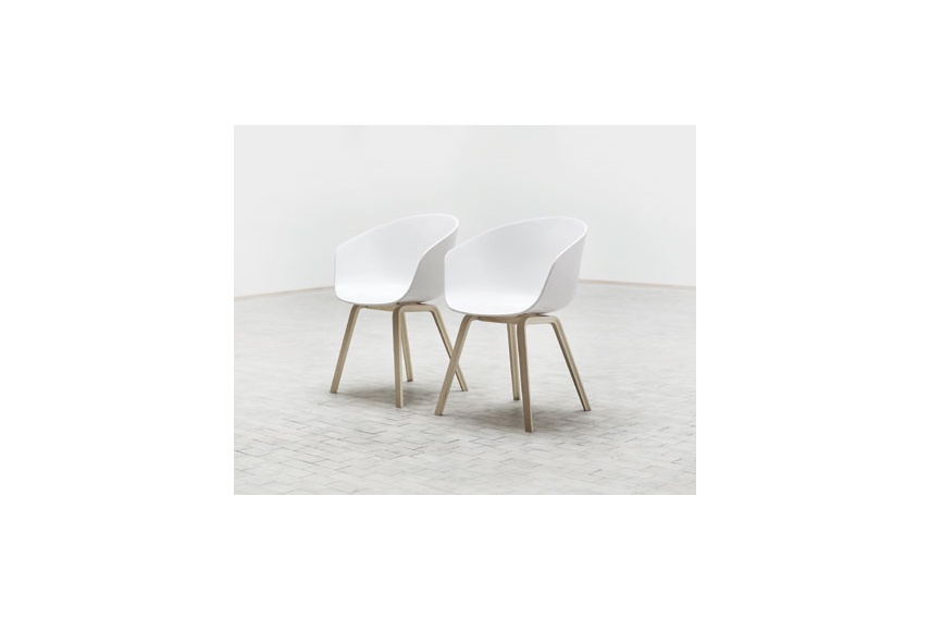 About A Chair with arms – seat is polypropylene in black/white