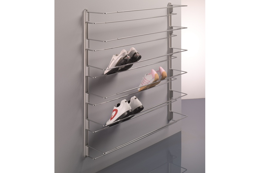 Ambos front-mounted shoe rack on wall with guides.