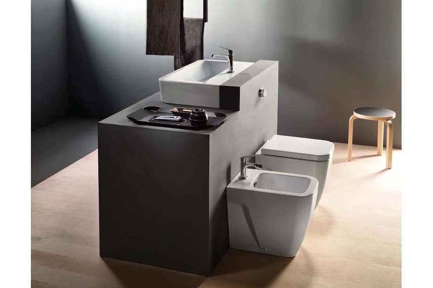 Smooth BTW bidet and pan.