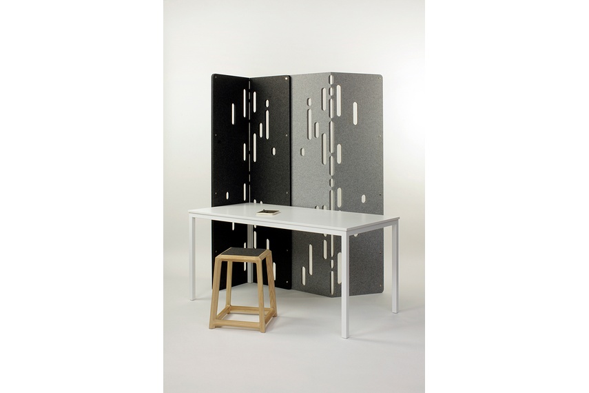 The screen allows the user to define space through both visual screening and the reduction of ambient noise.