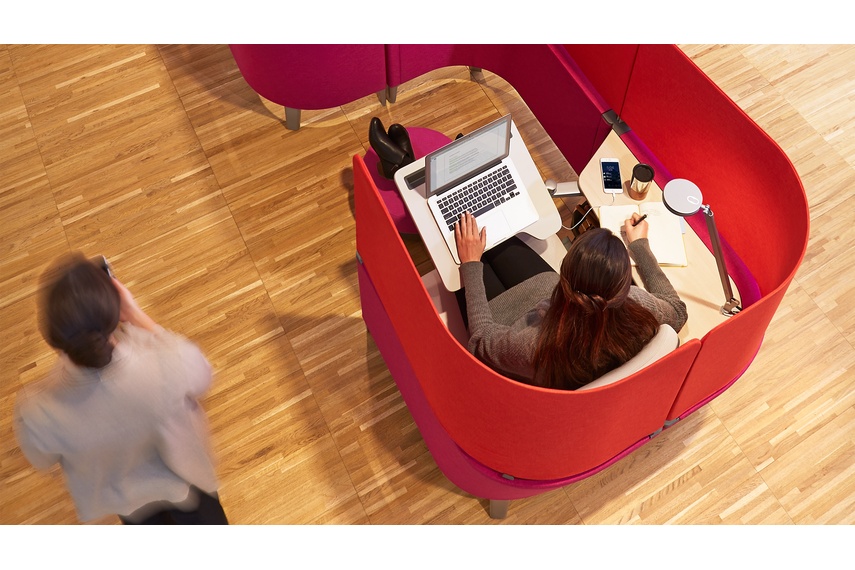 The adjustable worksurface holds technology at eye level, reducing neck and shoulder strain.