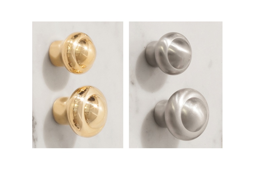 Perrin & Rowe cabinet knobs are available in two sizes – left: uncoated bare brass, right: pewter